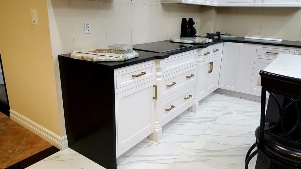 Inspiration for a transitional marble floor kitchen remodel in Boston with an undermount sink, gray cabinets, quartz countertops and stainless steel appliances