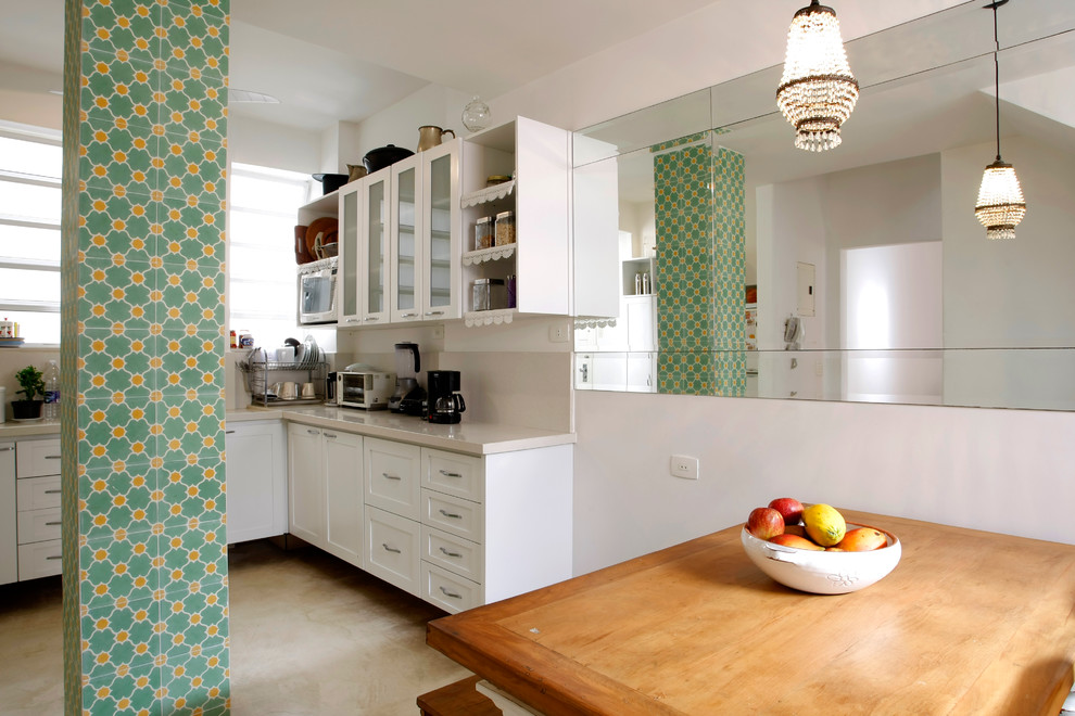 Example of a trendy kitchen design in Other with beige backsplash and stone slab backsplash