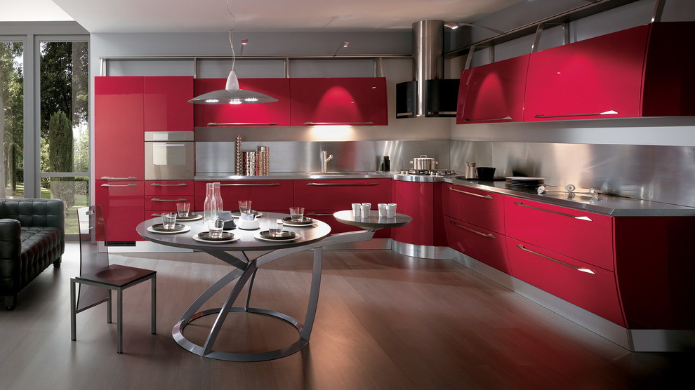 Eat-in kitchen - large modern l-shaped dark wood floor eat-in kitchen idea in Melbourne with a double-bowl sink, raised-panel cabinets, red cabinets, stainless steel countertops, metallic backsplash, metal backsplash, paneled appliances and two islands