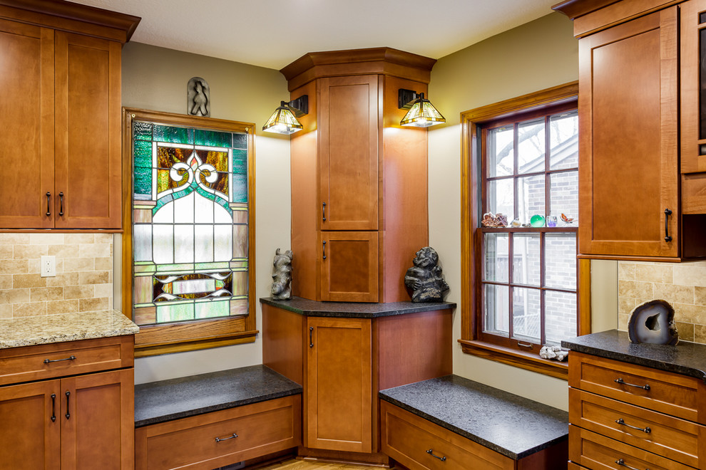 Inspiration for a small traditional galley kitchen/diner in Other with a submerged sink, shaker cabinets, medium wood cabinets, granite worktops, travertine splashback, stainless steel appliances and light hardwood flooring.