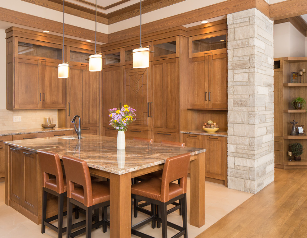 Example of a large arts and crafts u-shaped porcelain tile eat-in kitchen design in St Louis with an undermount sink, recessed-panel cabinets, medium tone wood cabinets, quartz countertops, brown backsplash, porcelain backsplash, paneled appliances and an island