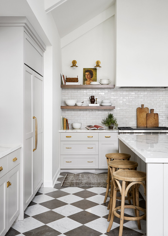 Inspiration for a large rural u-shaped kitchen/diner in Chicago with a belfast sink, shaker cabinets, grey cabinets, white splashback, terracotta splashback, stainless steel appliances, marble flooring, an island, multi-coloured floors and white worktops.