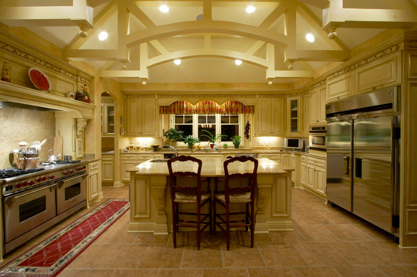 This is an example of a large mediterranean kitchen in Minneapolis with an island.