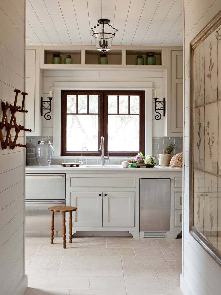 Kitchen - cottage kitchen idea in Austin with beaded inset cabinets and gray cabinets