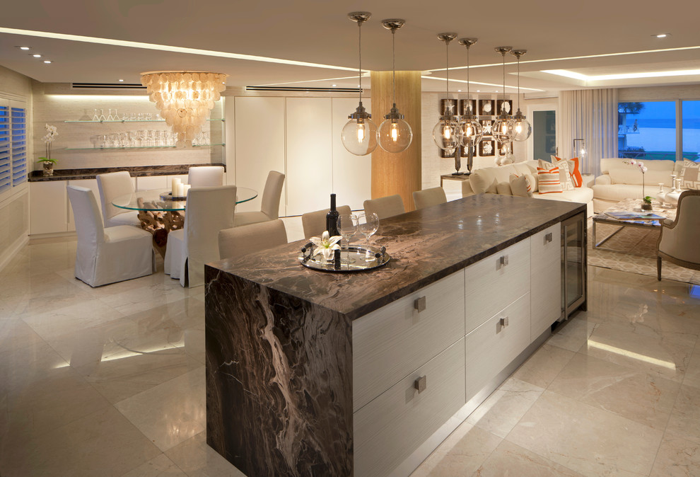 Design ideas for a contemporary open plan kitchen in Miami with flat-panel cabinets.
