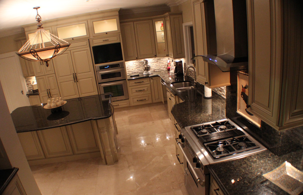 Example of a tuscan kitchen design in Tampa