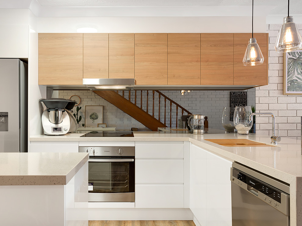 Example of a mid-sized minimalist kitchen design in Gold Coast - Tweed