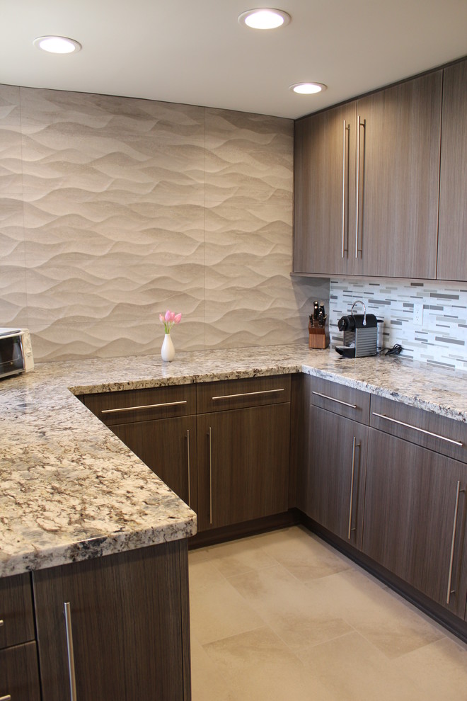 Example of a mid-sized trendy l-shaped porcelain tile eat-in kitchen design in Houston with an undermount sink, flat-panel cabinets, medium tone wood cabinets, granite countertops, gray backsplash, glass tile backsplash, stainless steel appliances and no island