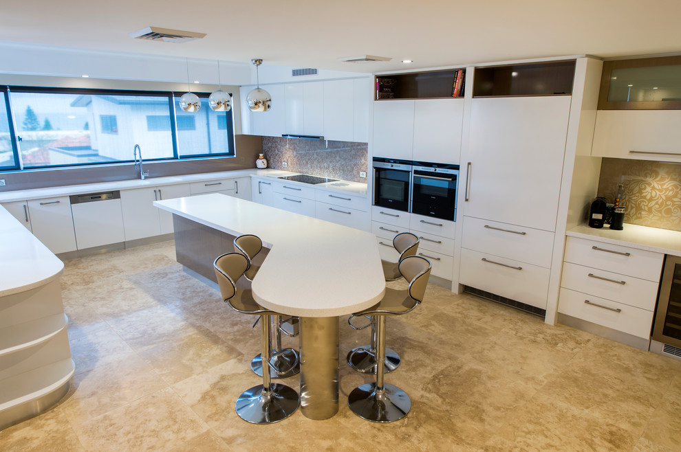 Example of a large trendy u-shaped porcelain tile open concept kitchen design in Perth with an integrated sink, flat-panel cabinets, white cabinets, solid surface countertops, multicolored backsplash, glass sheet backsplash, black appliances and an island