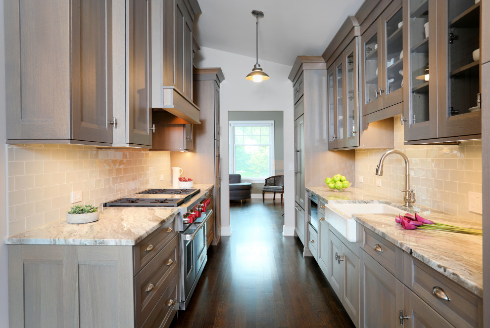 Inspiration for a large transitional galley dark wood floor and brown floor eat-in kitchen remodel in Chicago with a farmhouse sink, flat-panel cabinets, quartzite countertops, gray backsplash, ceramic backsplash, no island, brown countertops, brown cabinets and paneled appliances