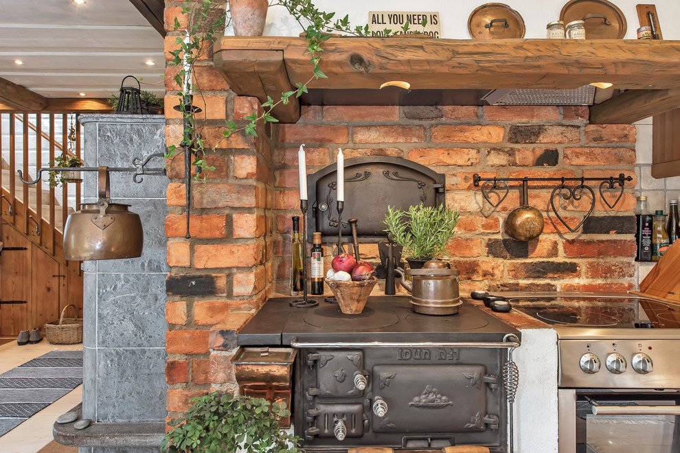 Photo of a medium sized rustic single-wall kitchen in Stockholm with no island.