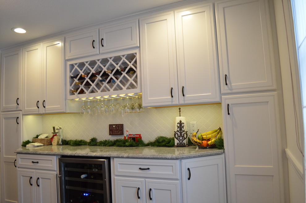 Large traditional kitchen/diner in Bridgeport with dark hardwood flooring.