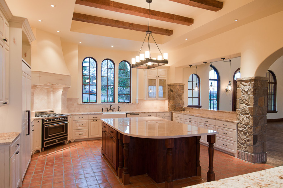 Example of a tuscan kitchen design in Portland