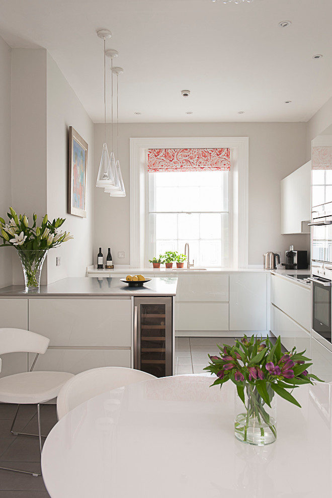 Example of a trendy kitchen design in Kent