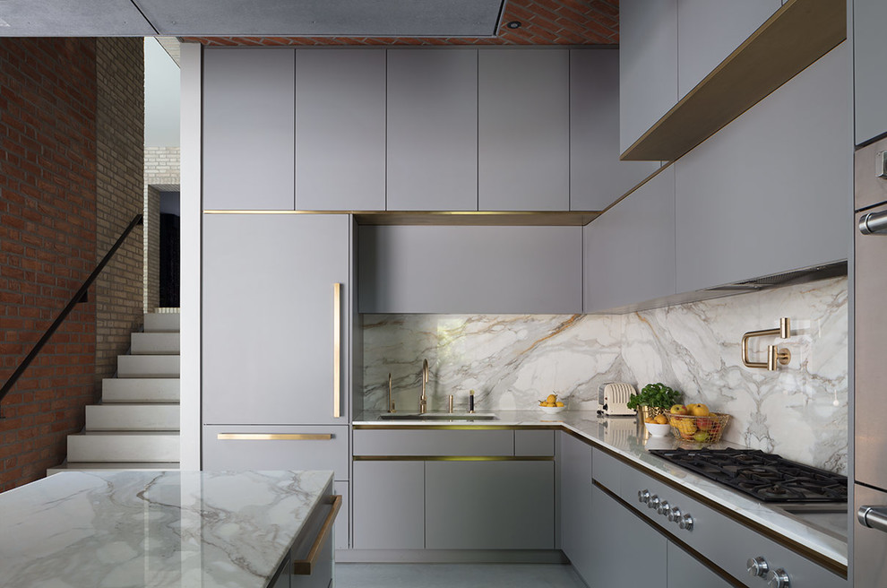Design ideas for a large contemporary l-shaped open plan kitchen in London with a submerged sink, flat-panel cabinets, grey cabinets, marble worktops, white splashback, marble splashback, stainless steel appliances, concrete flooring, an island, grey floors and white worktops.