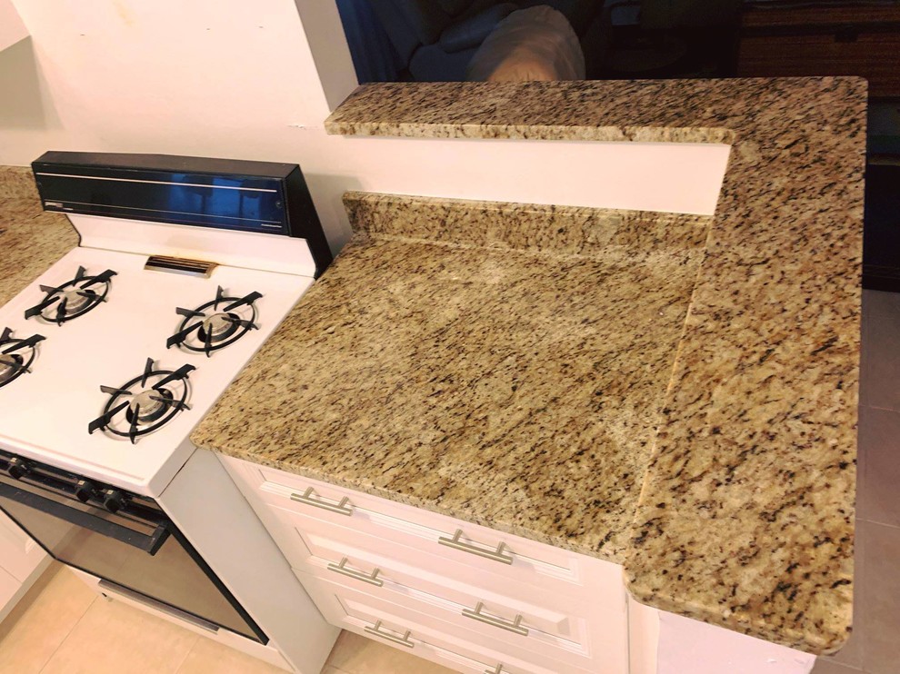 Mid-sized trendy kitchen photo in Tampa with granite countertops and brown countertops