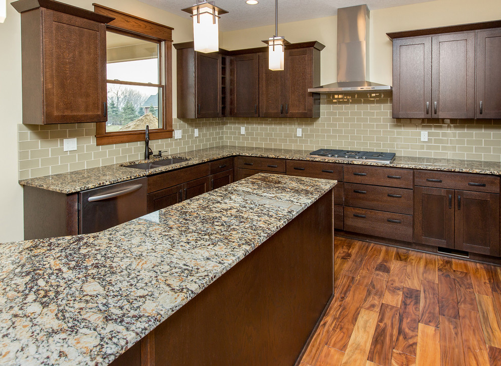 Kitchen - traditional kitchen idea in Other with granite countertops