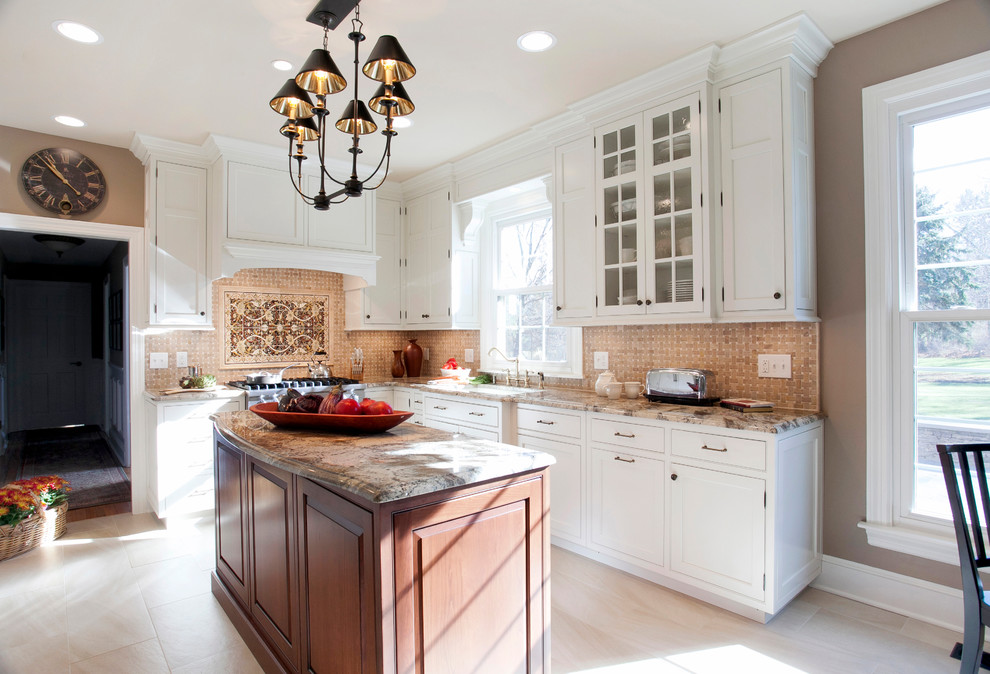 Inspiration for a timeless u-shaped enclosed kitchen remodel in Bridgeport with an undermount sink, glass-front cabinets, white cabinets, granite countertops, beige backsplash and paneled appliances