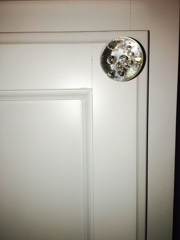 Glass knobs that are perfect for this 1920's cottage! Kitchen Milwaukee by Julie Carpet
