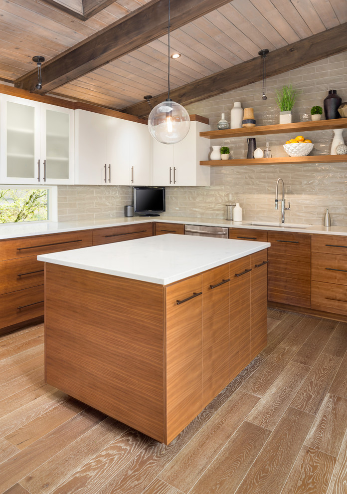 Example of a large 1960s l-shaped light wood floor and beige floor open concept kitchen design in Portland with an undermount sink, flat-panel cabinets, light wood cabinets, quartzite countertops, beige backsplash, stainless steel appliances and an island