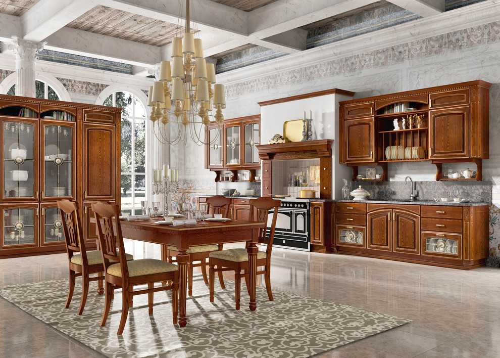 Inspiration for a large timeless l-shaped ceramic tile eat-in kitchen remodel in San Diego with a double-bowl sink, flat-panel cabinets, medium tone wood cabinets, granite countertops, gray backsplash, stone slab backsplash, paneled appliances and no island