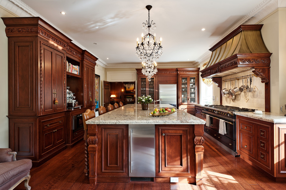 Kitchen - traditional kitchen idea in Montreal with granite countertops