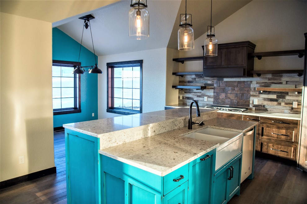 Inspiration for a large farmhouse l-shaped vinyl floor and brown floor eat-in kitchen remodel in Other with a farmhouse sink, shaker cabinets, turquoise cabinets, quartz countertops, multicolored backsplash, ceramic backsplash, stainless steel appliances, an island and multicolored countertops