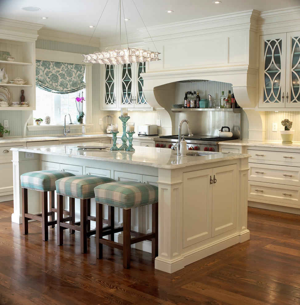Example of a large classic l-shaped dark wood floor and brown floor open concept kitchen design in Toronto with beaded inset cabinets, white cabinets, an undermount sink, quartzite countertops, white backsplash, wood backsplash, stainless steel appliances and an island