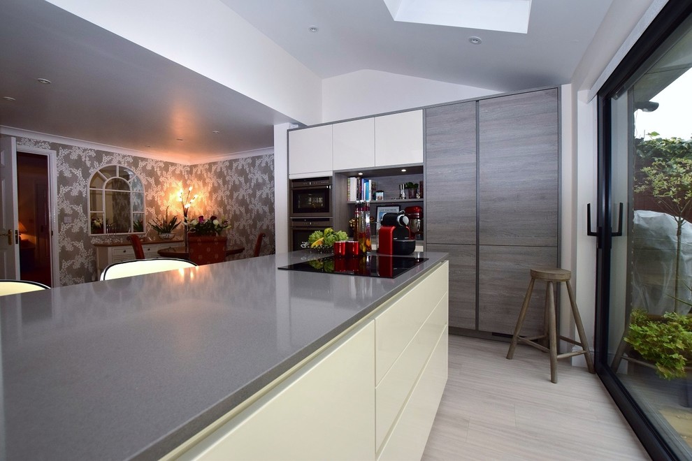 Photo of a contemporary grey and cream kitchen in Oxfordshire.