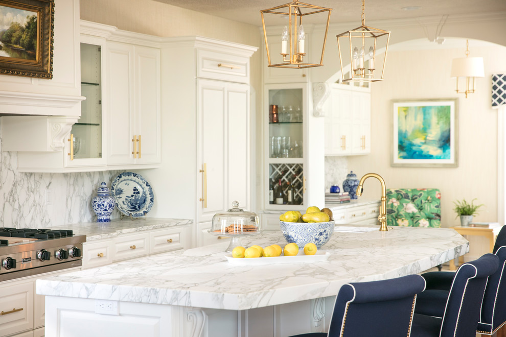 Example of a large classic eat-in kitchen design in Other with an undermount sink, shaker cabinets, white cabinets, marble countertops, marble backsplash and an island