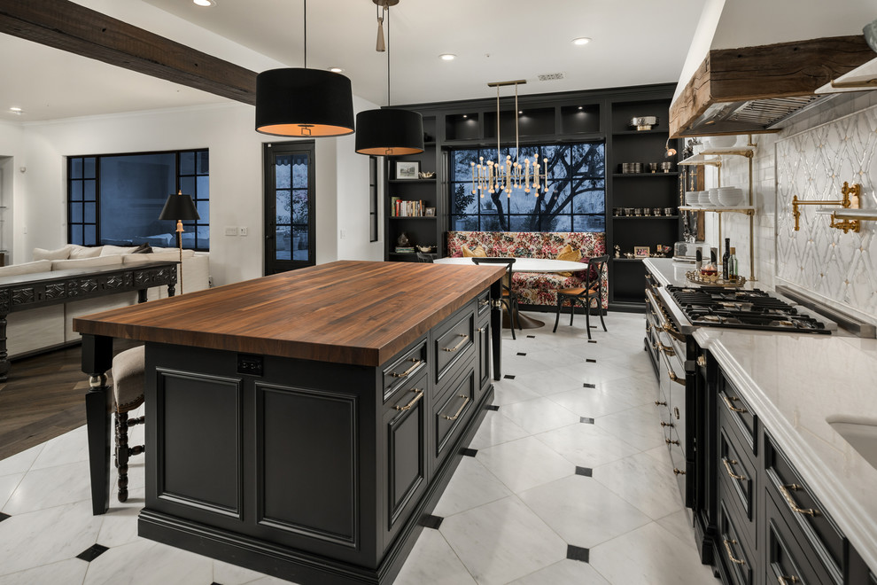 Enclosed kitchen - huge country u-shaped marble floor and multicolored floor enclosed kitchen idea in Phoenix with a farmhouse sink, raised-panel cabinets, dark wood cabinets, quartzite countertops, multicolored backsplash, marble backsplash, stainless steel appliances, an island and multicolored countertops