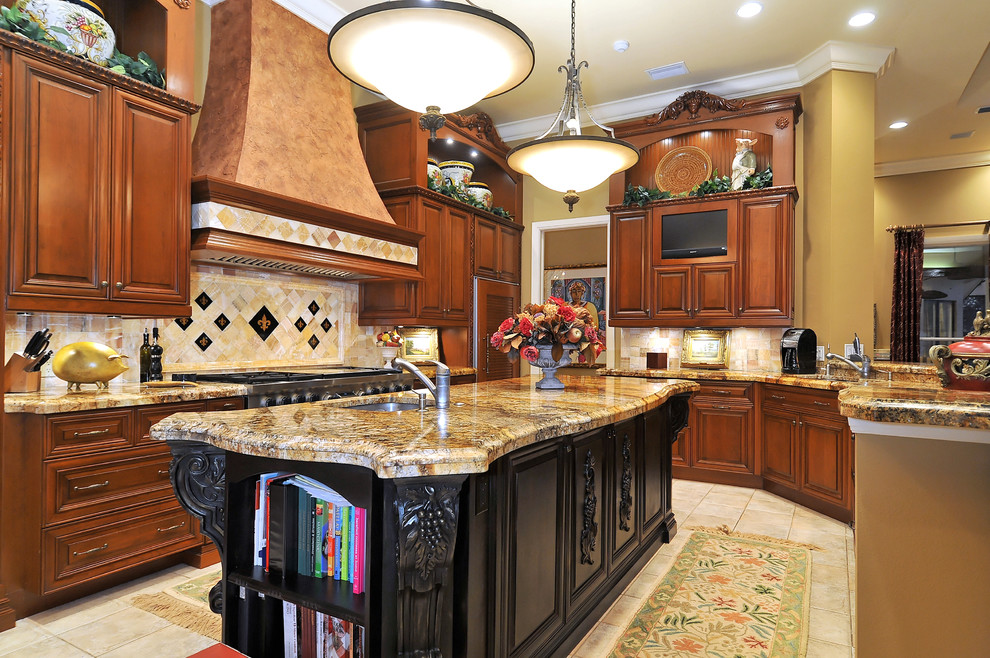 Inspiration for a mediterranean kitchen remodel in Tampa with granite countertops