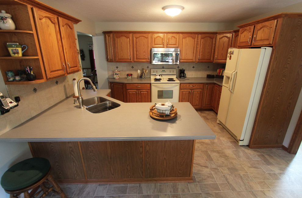 Gray Corian Countertop and Gray Tile Backsplash Wadsworth, OH