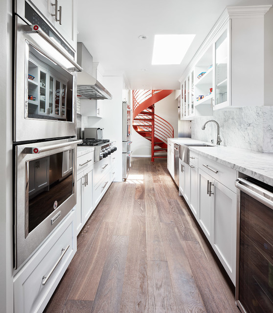 Great Highway Kitchen with spiral stair beyond Contemporáneo Cocina