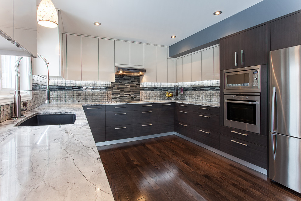 Inspiration for a large modern u-shaped dark wood floor eat-in kitchen remodel in Ottawa with flat-panel cabinets, a double-bowl sink, gray cabinets, granite countertops, white appliances and an island