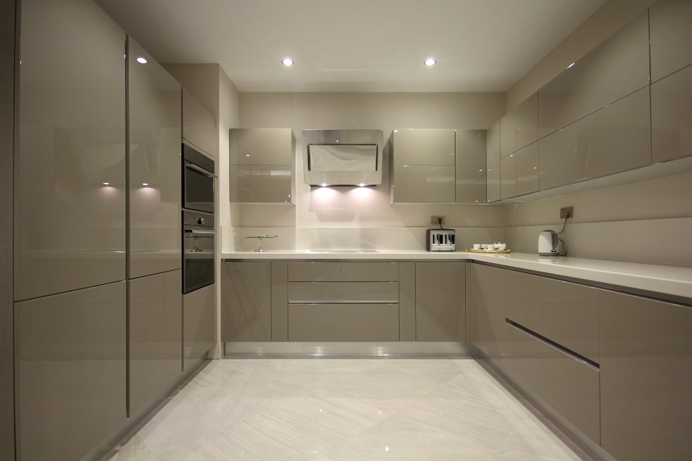 This is an example of a medium sized modern u-shaped enclosed kitchen in Other with a double-bowl sink, flat-panel cabinets, grey cabinets, white splashback, stone slab splashback, black appliances, ceramic flooring and no island.