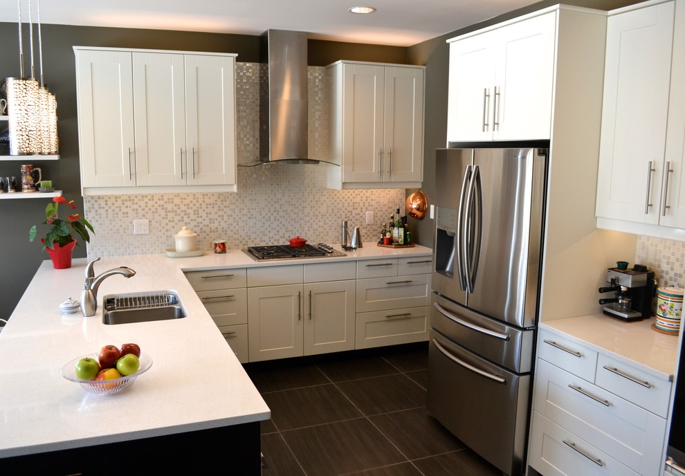 Mid-sized trendy u-shaped medium tone wood floor open concept kitchen photo in Vancouver with a double-bowl sink, shaker cabinets, quartz countertops, metallic backsplash, stainless steel appliances, a peninsula and white cabinets