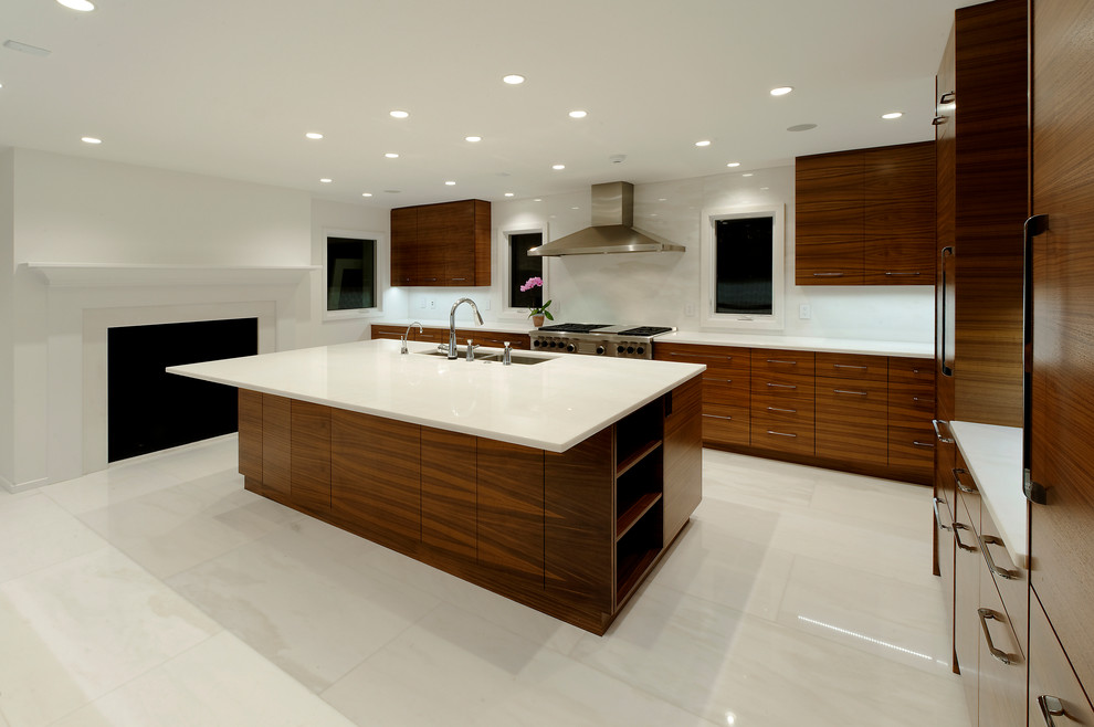 Photo of a contemporary kitchen in DC Metro with integrated appliances, a double-bowl sink, marble worktops, white splashback, an island and white floors.