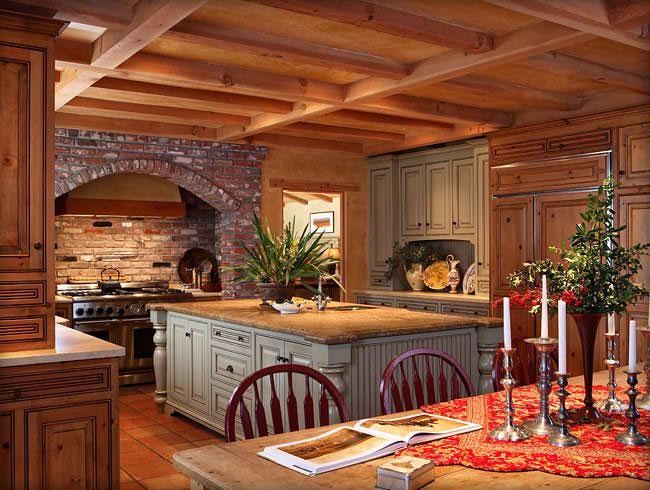 Idéer för att renovera ett stort medelhavsstil kök med öppen planlösning, med skåp i mellenmörkt trä, träbänkskiva, rostfria vitvaror, klinkergolv i terrakotta och en köksö