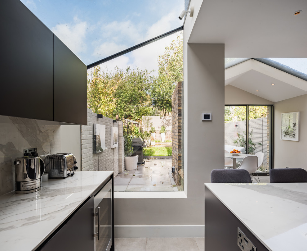 This is an example of a contemporary kitchen in Kent.