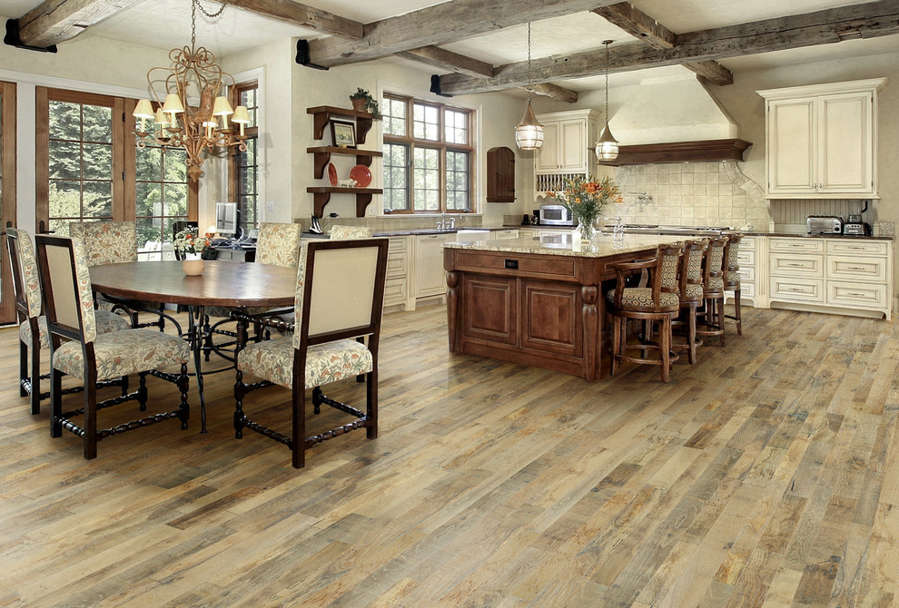 Design ideas for a large rustic kitchen/diner in DC Metro with granite worktops, light hardwood flooring and an island.
