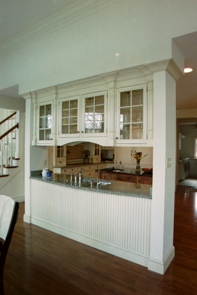 Eat-in kitchen - traditional eat-in kitchen idea in Other with beaded inset cabinets and white cabinets