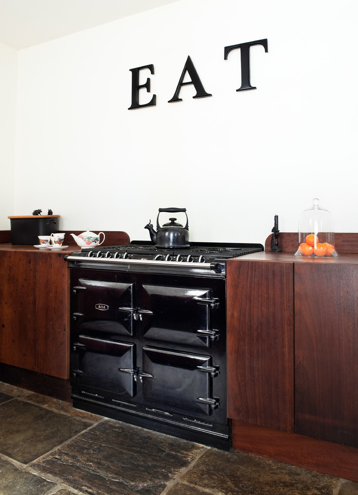 Example of an eclectic kitchen design in London