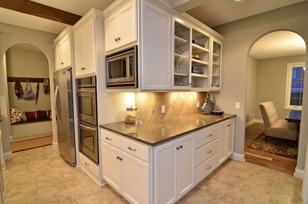 Example of a classic kitchen design in Minneapolis with stainless steel appliances
