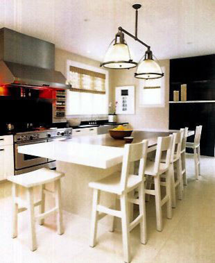 This is an example of a medium sized contemporary galley kitchen/diner in Chicago with a submerged sink, shaker cabinets, white cabinets, granite worktops, stainless steel appliances, ceramic flooring and an island.