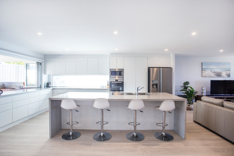 Hamptons Inspired Waterfront Home with a Twist Beach Style Kitchen