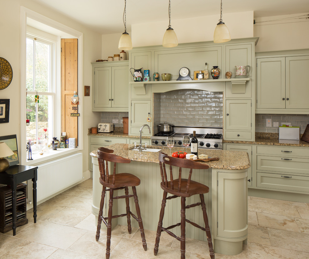 Design ideas for a classic kitchen in Dublin with beaded cabinets, green cabinets and an island.