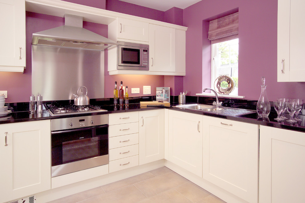 Photo of a traditional grey and purple kitchen in West Midlands with shaker cabinets, white cabinets, metallic splashback and metal splashback.