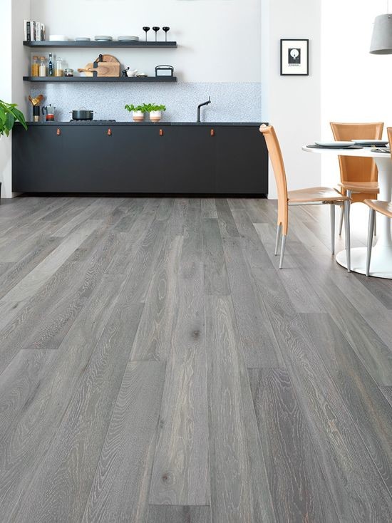 Foto di una cucina design con pavimento grigio