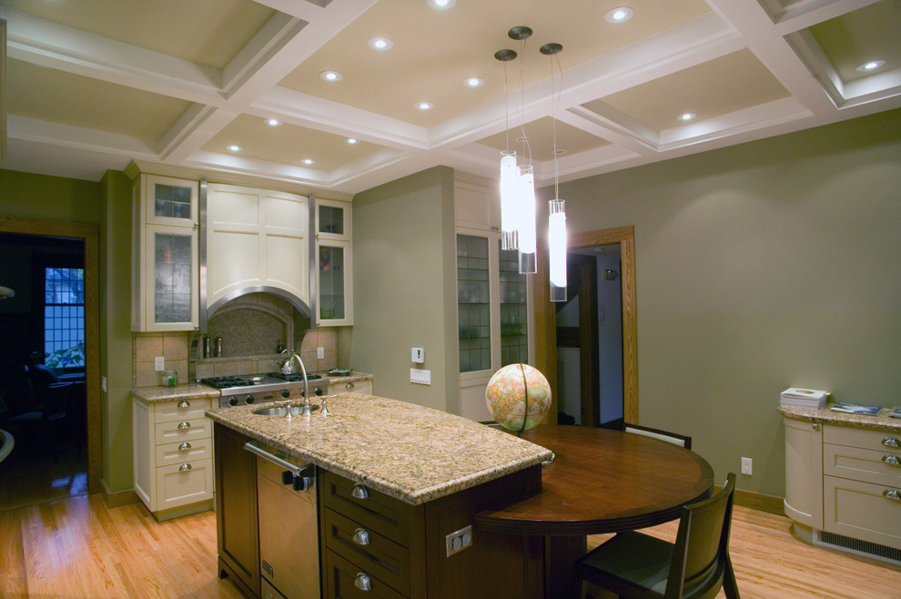Example of a large trendy l-shaped light wood floor eat-in kitchen design in Other with a double-bowl sink, beaded inset cabinets, white cabinets, stainless steel appliances, an island, granite countertops, beige backsplash and ceramic backsplash